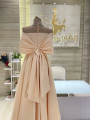 A classic black, sleeveless cocktail dress with a simple silhouette, ideal for a formal occasion.
